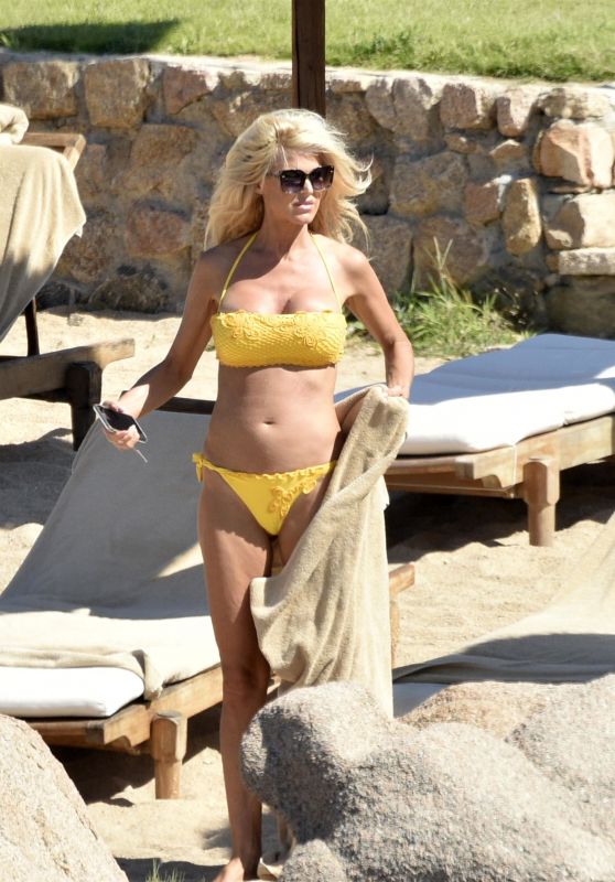 Victoria Silvstedt in a Yellow Bikini at the Beach in Sardinia 08/03/2019