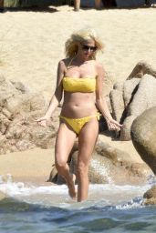 Victoria Silvstedt in a Yellow Bikini at the Beach in Sardinia 08/03/2019