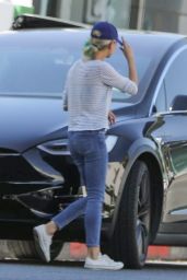 Mila Kunis - Showing Her New Blonde and Green Hair