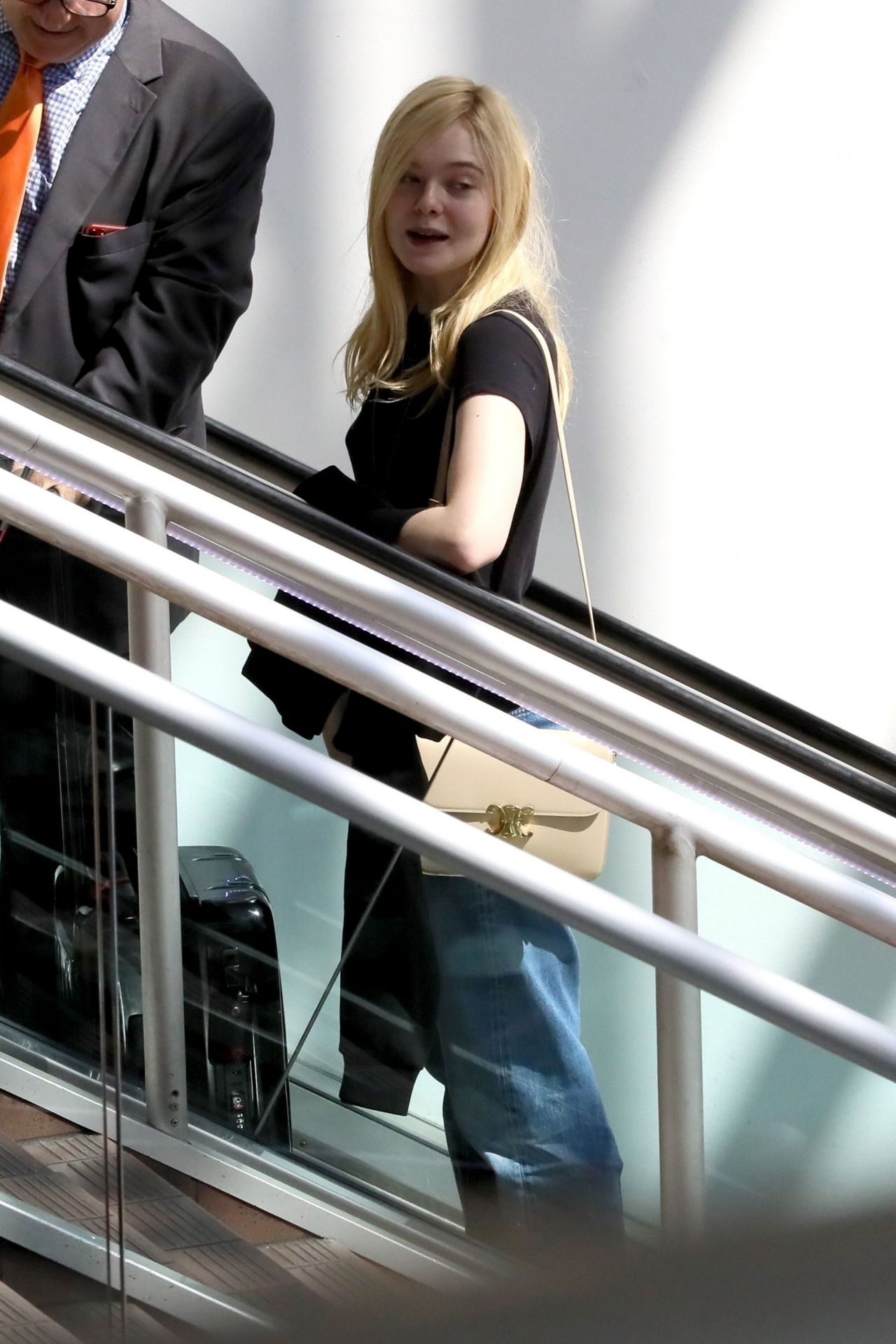 Elle Fanning Make-Up Free - Prepares to Catch a Flight Out of LA 10/01