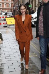 Emilia Clarke in a Plunging Terracotta Trouser Suit 10/24/2019