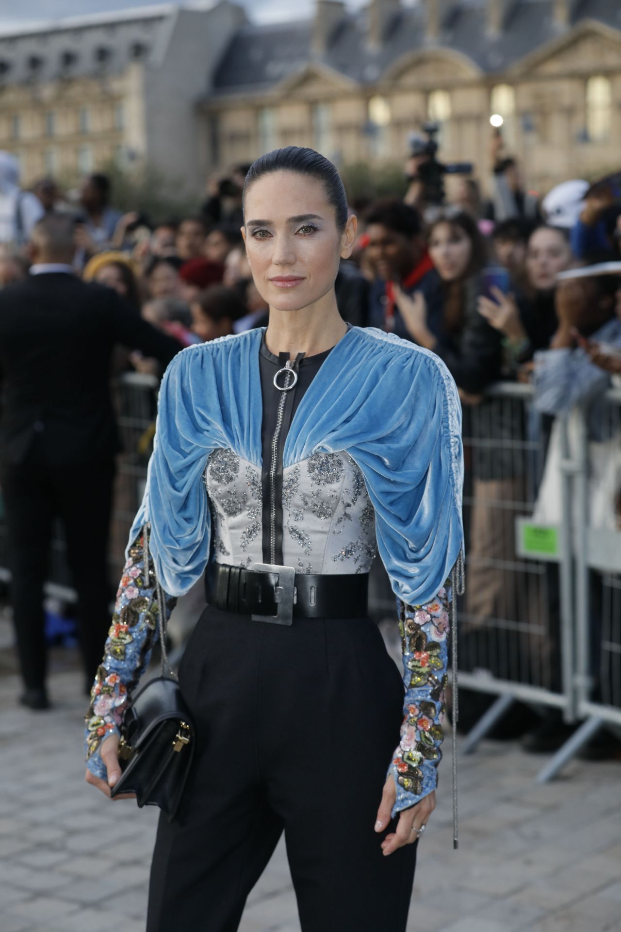 Jennifer Connelly makes bold fashion statement in ruffle-heavy dress for Louis  Vuitton fashion show