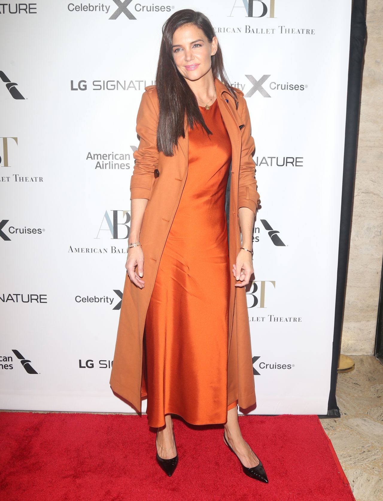 Katie Holmes looking good in orange at some event in NYC