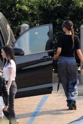 Selena Gomez in Satin Cargo Pants and a Black Blouse 10/12/2019