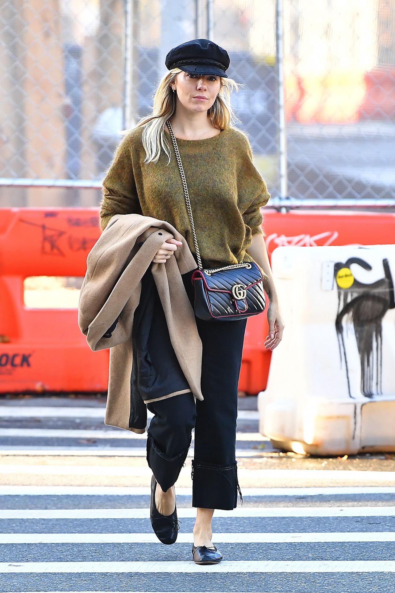 Sienna Miller in a Green Sweater in New York City 10/23/2019 • CelebMafia