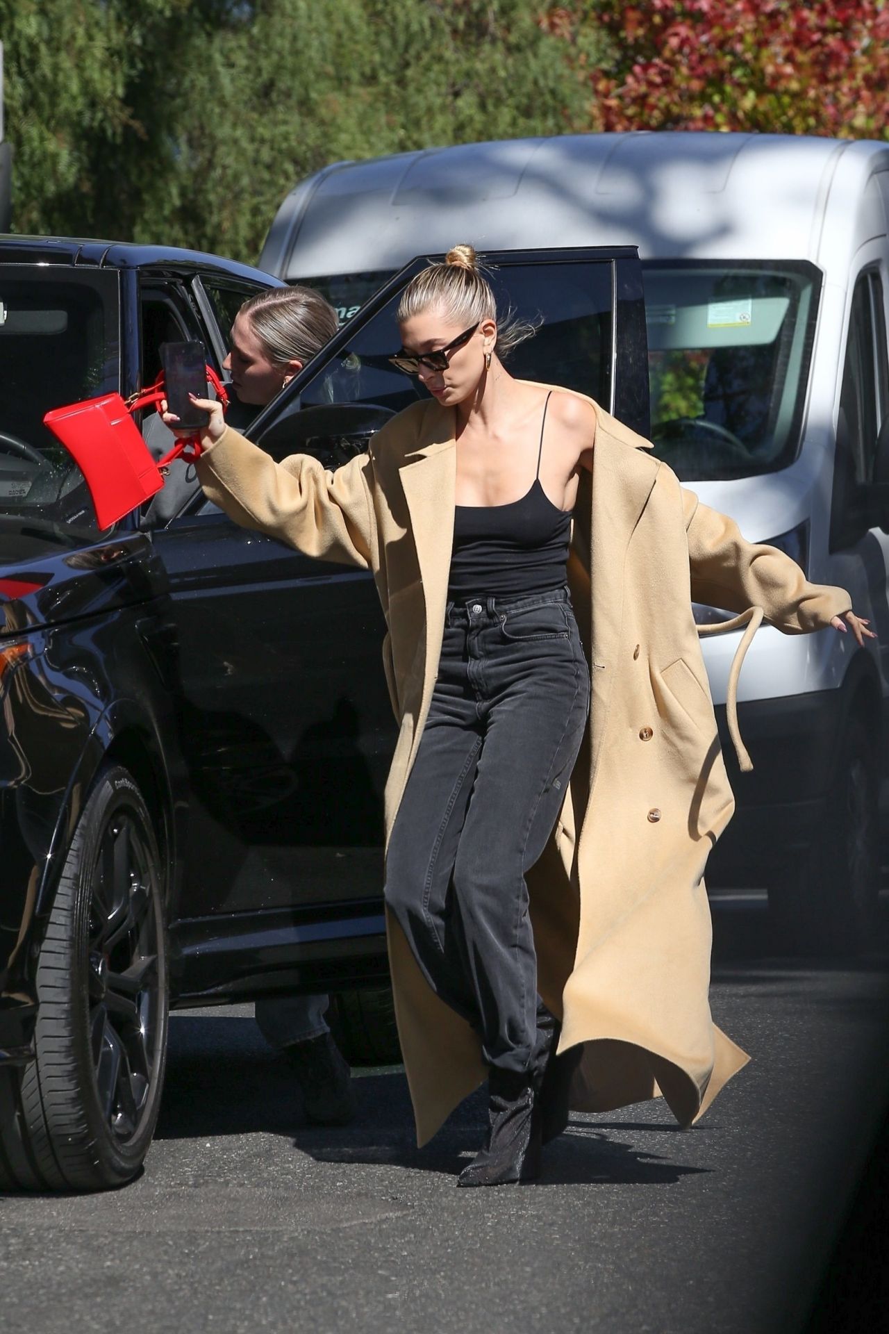 Hailey Rhode Bieber in Black Heels, Dark Jeans and a Black Tank Top 10 ...