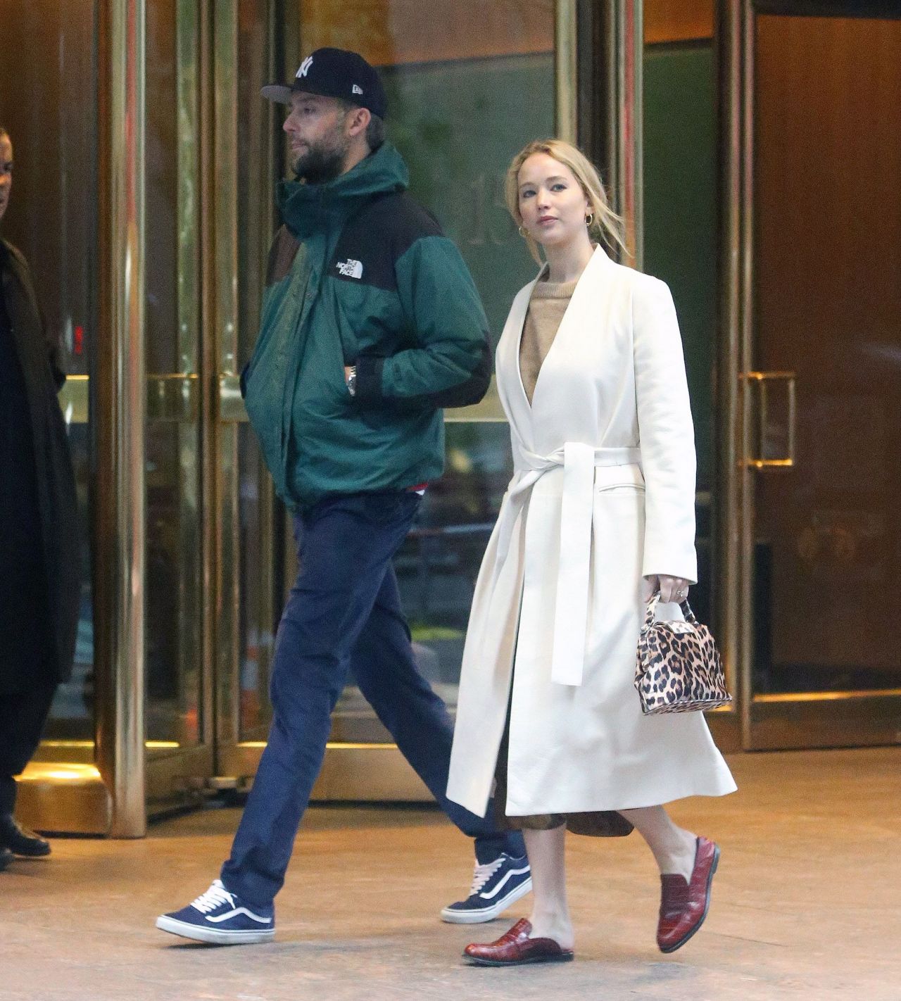 Jennifer Lawrence Wearing a Belted White Coat - NYC 11/18/2019 • CelebMafia