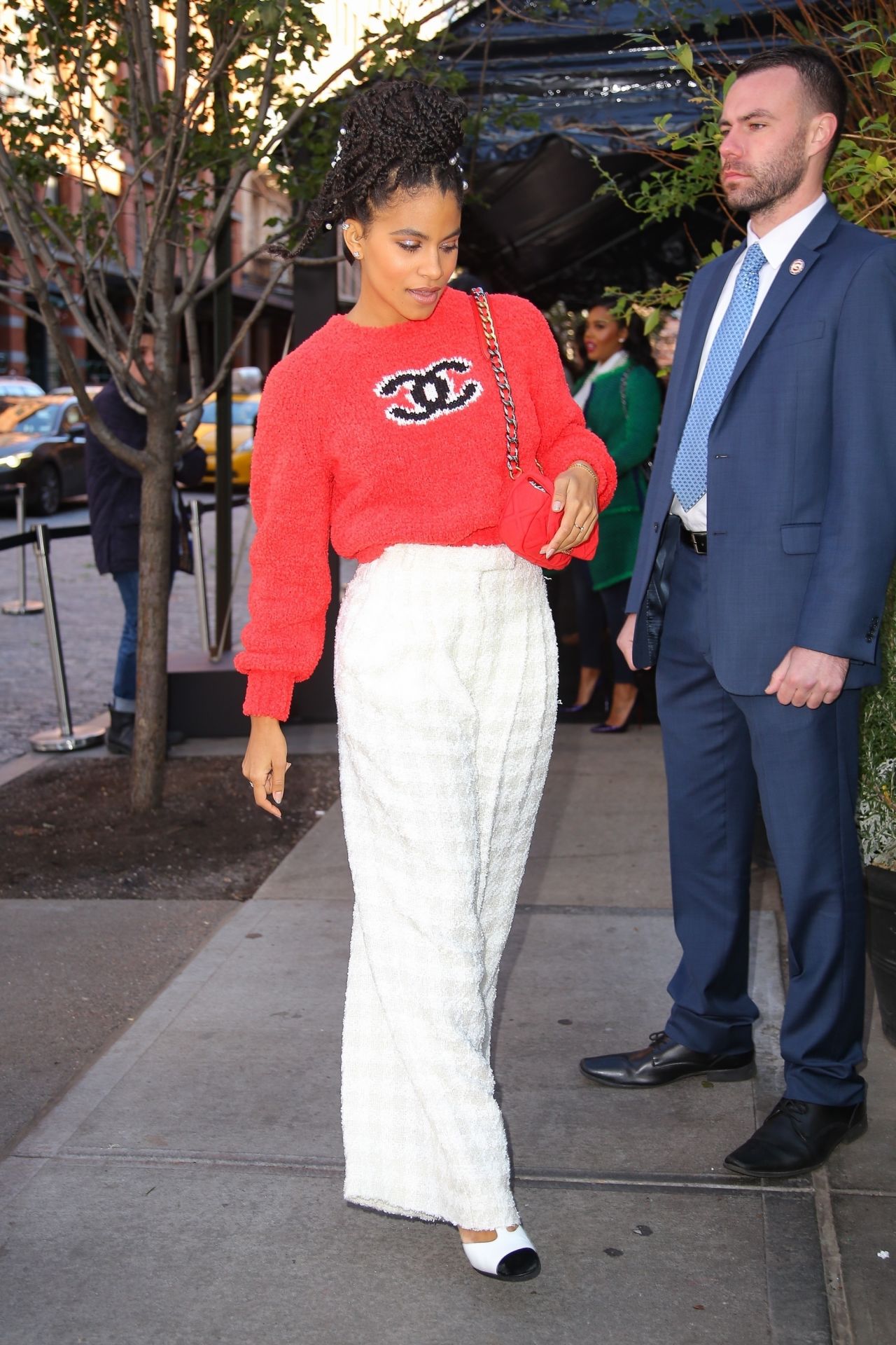 Zazie Beetz in a Channel Red Sweater 11/04/2019 • CelebMafia