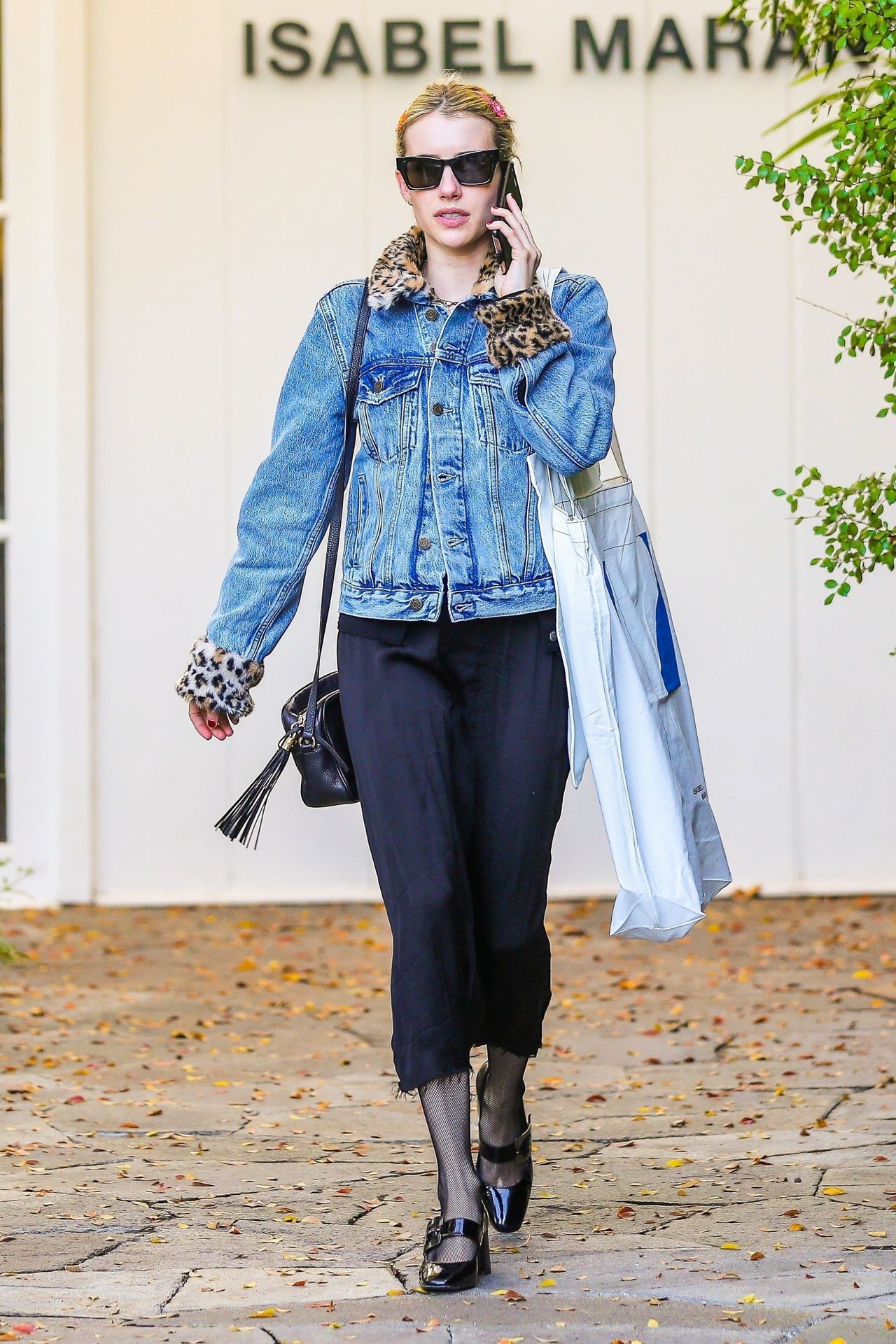 Emma Robert carrying a Gucci Soho Disco bag