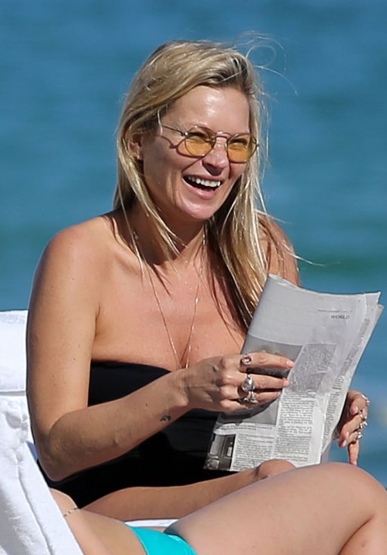 Kate Moss in a Black Swimsuit 12/03/2019