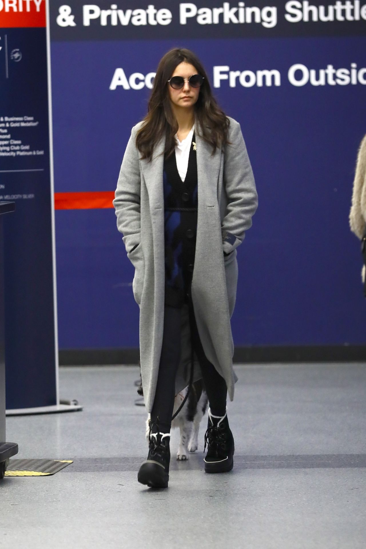 Nina Dobrev in Travel Outfit - LAX Airport in Los Angeles 12/23/2019