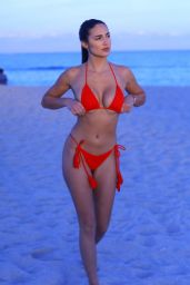 Tao Wickrath in a Red Bikini 12/6/2019