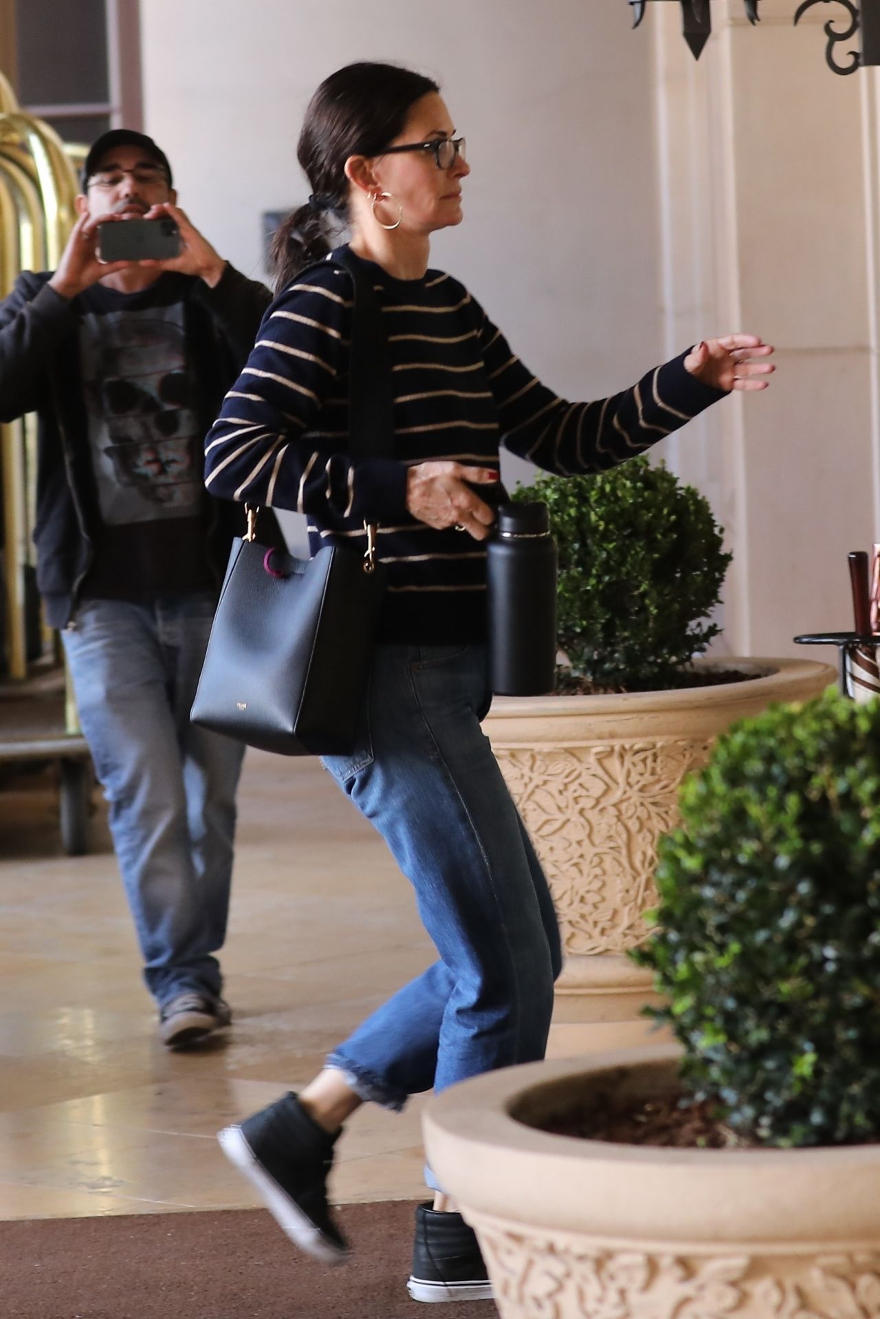 Courteney Cox in Casual Outfit - Arriving at the Montage Hotel in