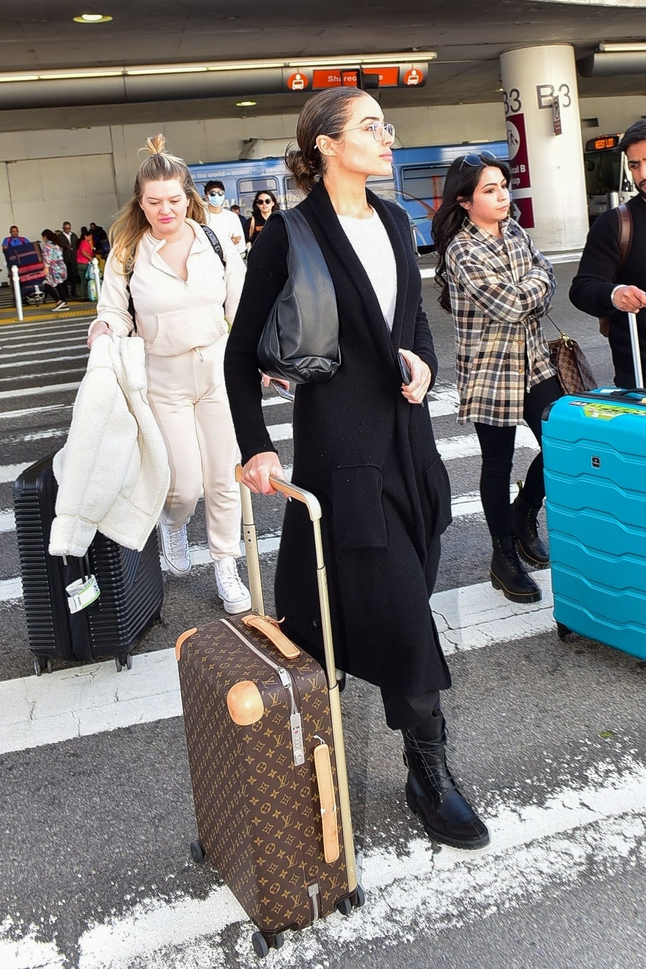 Olivia Culpo - Arrives at LAX Airport in LA 02/23/2020 • CelebMafia