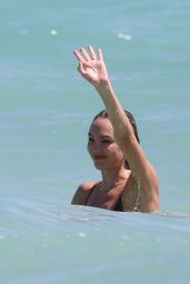 Candice Swanepoel in a Bikini - Beach in Miami 03/16/2020