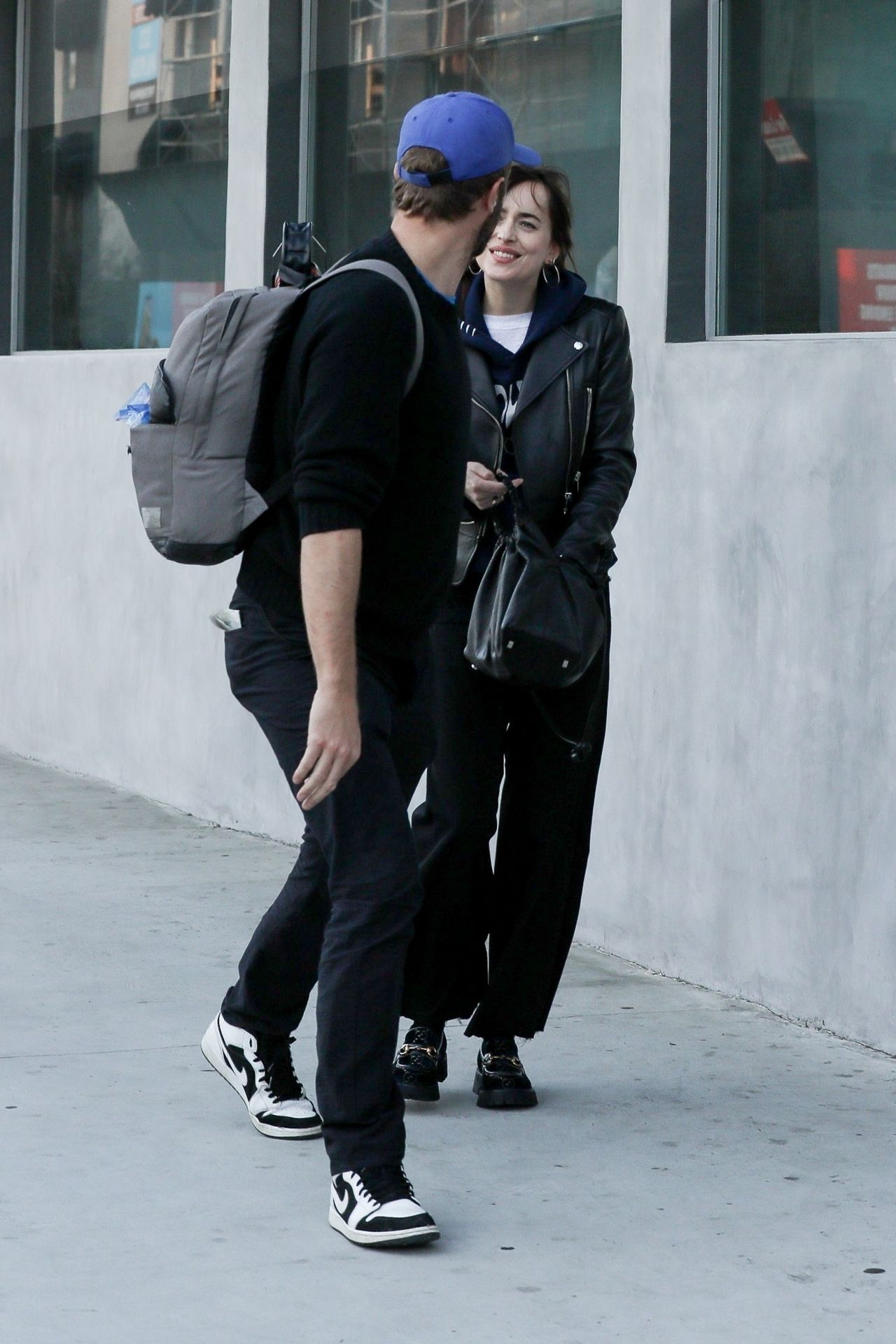 Dakota Johnson and Chris Martin at Crossroads in Los Angeles 03/11/2020 ...