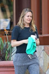 Alicia Silverstone in a Simple Black T-Shirt and Charcoal Grey Drawstring Sweatpants