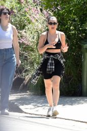 Charli XCX in a Black Nike Sports Bra and Matching Gym Shorts