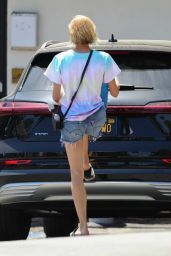 Diane Kruger Wearing a Tie-Dye Shirt Over Frayed Denim Shorts