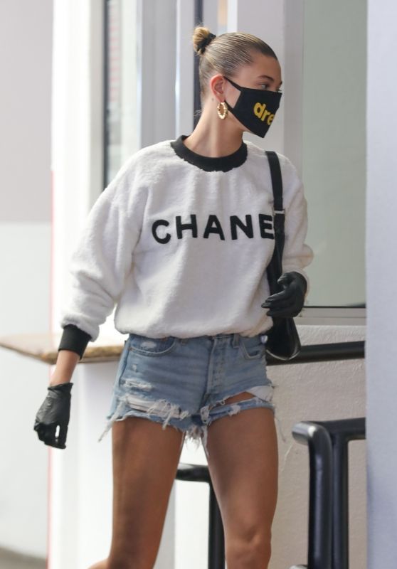 Hailey Bieber in Fuzzy White Chanel Sweatshirt and Daisy Dukes