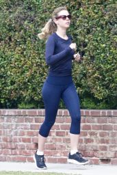 Mia Goth in Navy Blue Long Sleeve Athletic Shirt and Matching Blue Leggings
