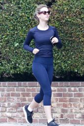 Mia Goth in Navy Blue Long Sleeve Athletic Shirt and Matching Blue Leggings