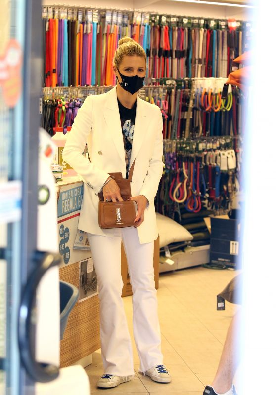 Michelle Hunziker and Tomaso Trussardi Shopping at Pet Shop and at Trussardi Outlet in Bergamo
