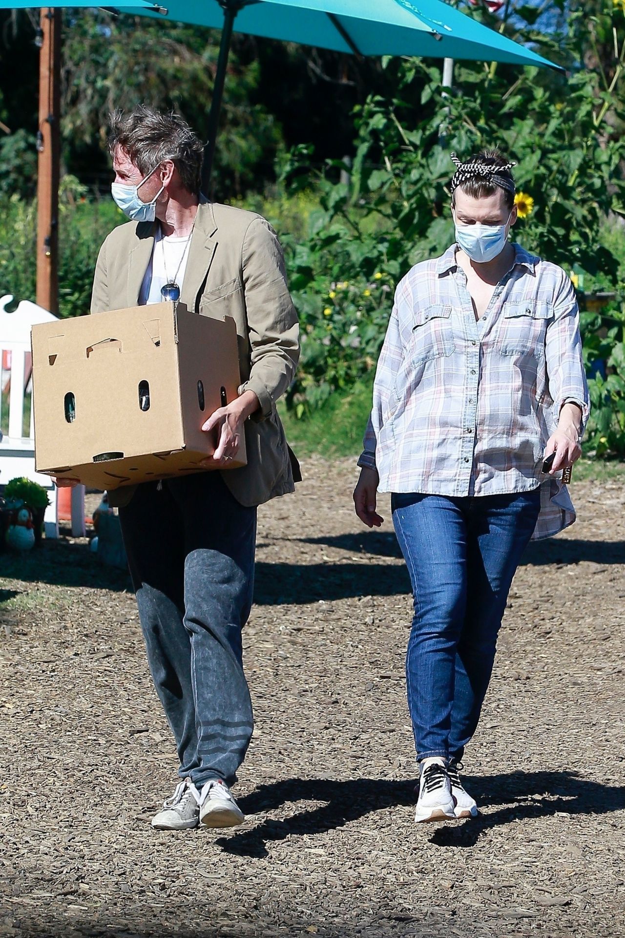 Milla Jovovich - Shopping at a Plant Nursery in Malibu 05/21/2020