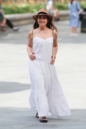 Myleene Klass Summer Chic in a White Maxi Dress and a Fedora