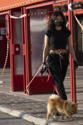 Thylane Blondeau in a Black Cropped Tee, Matching Joggers and Biker Boots