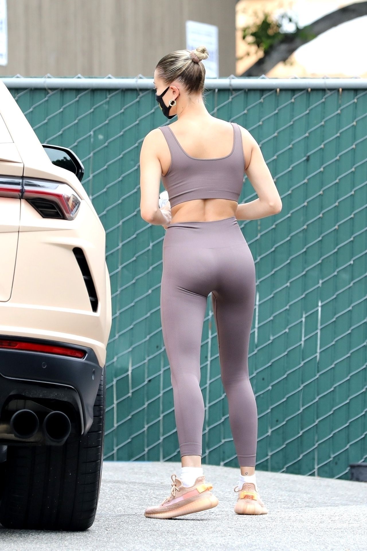 Hailey Bieber in a Mauve Sports Bra and Matching Leggings - Out in