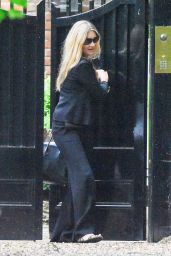 Kate Moss in a Flared Black Trousers and Jacket 06/17/2020