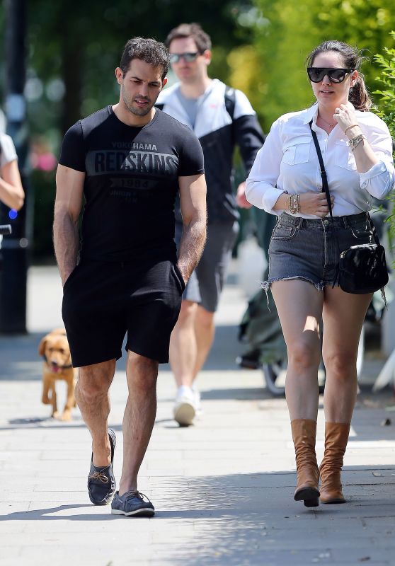 Kelly Brook Shows Off Her Legs in Distressed Shorts and a White Shirt Out in London 05/31/2020