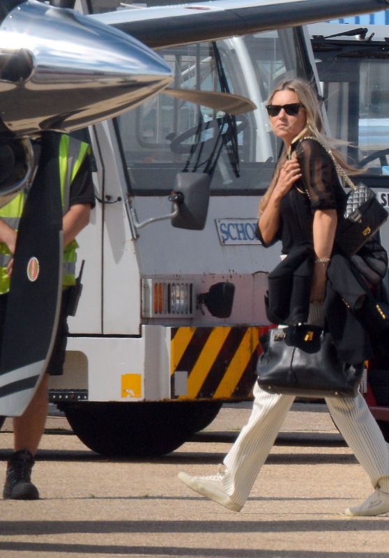 Kate Moss - Boarding a Private Jet at Luton Airport in London 07/23/2020