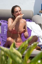 Megan McKenna in a Bikini Relaxes Poolside in Marbella 07/22/2020