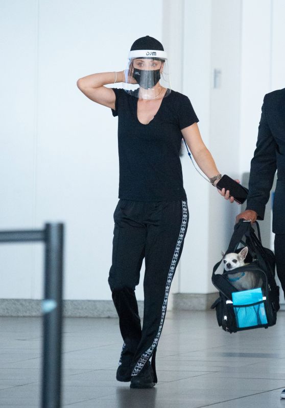 Kaley Cuoco in Travel Outfit - JFK Airport in NYC 08/10/2020