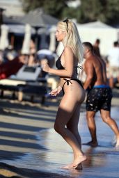 Lottie Moss in a Black Bikini - Relaxing at SantAnna Beach Club in Mykonos 08/21/2020