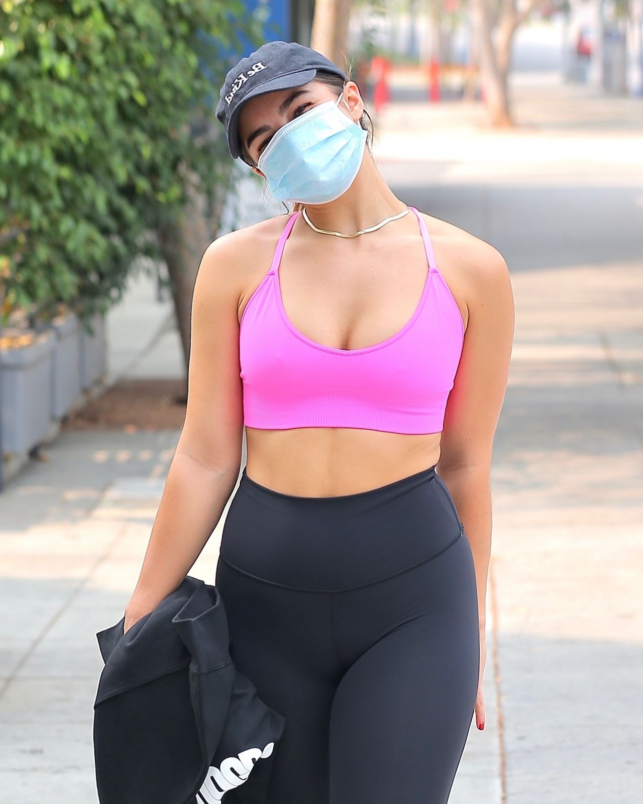 addison rae shows off her curves in a pink sports bra and black leggings  while leaving workout in west hollywood, california-150920_21