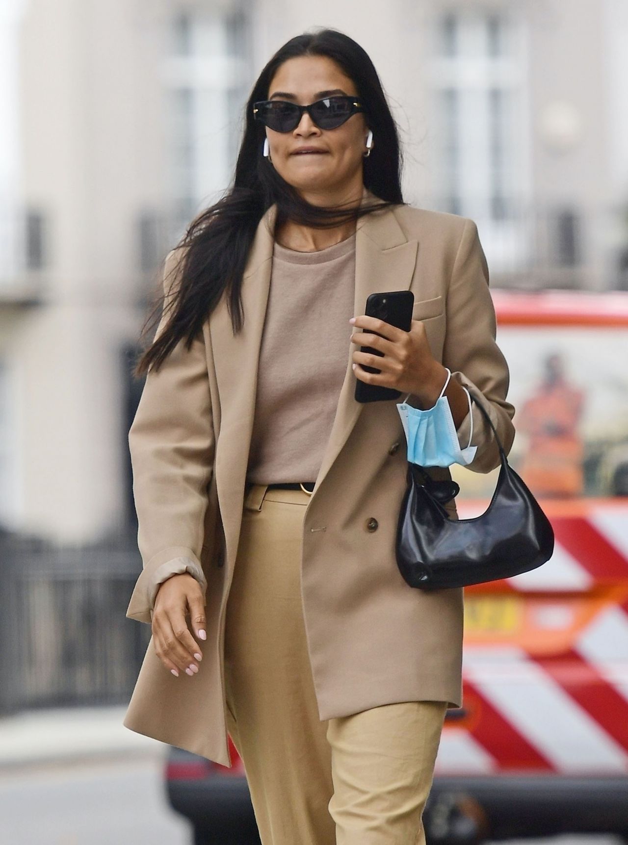 shanina-shaik-looking-stylish-in-a-beige-trousers-and-jacket-london-09-15-2020-3.jpg
