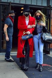 Miley Cyrus in a Red Trench Coat, Black Leather Pants and a Black Hat - NYC 10/02/2020