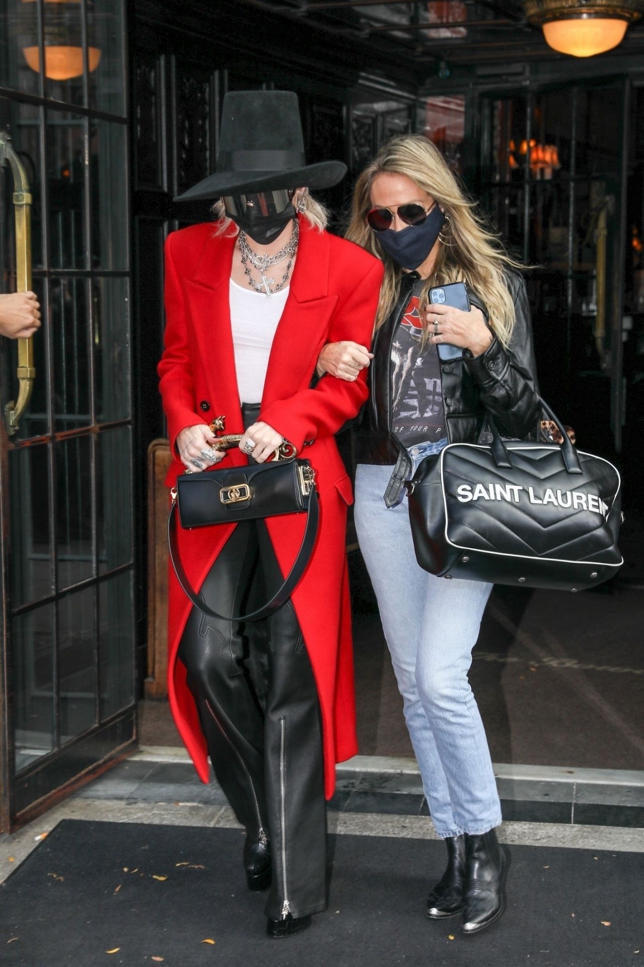 miley-cyrus-in-a-red-trench-coat-black-leather-pants-and-a-black-hat-nyc-10-02-2020-8.jpg