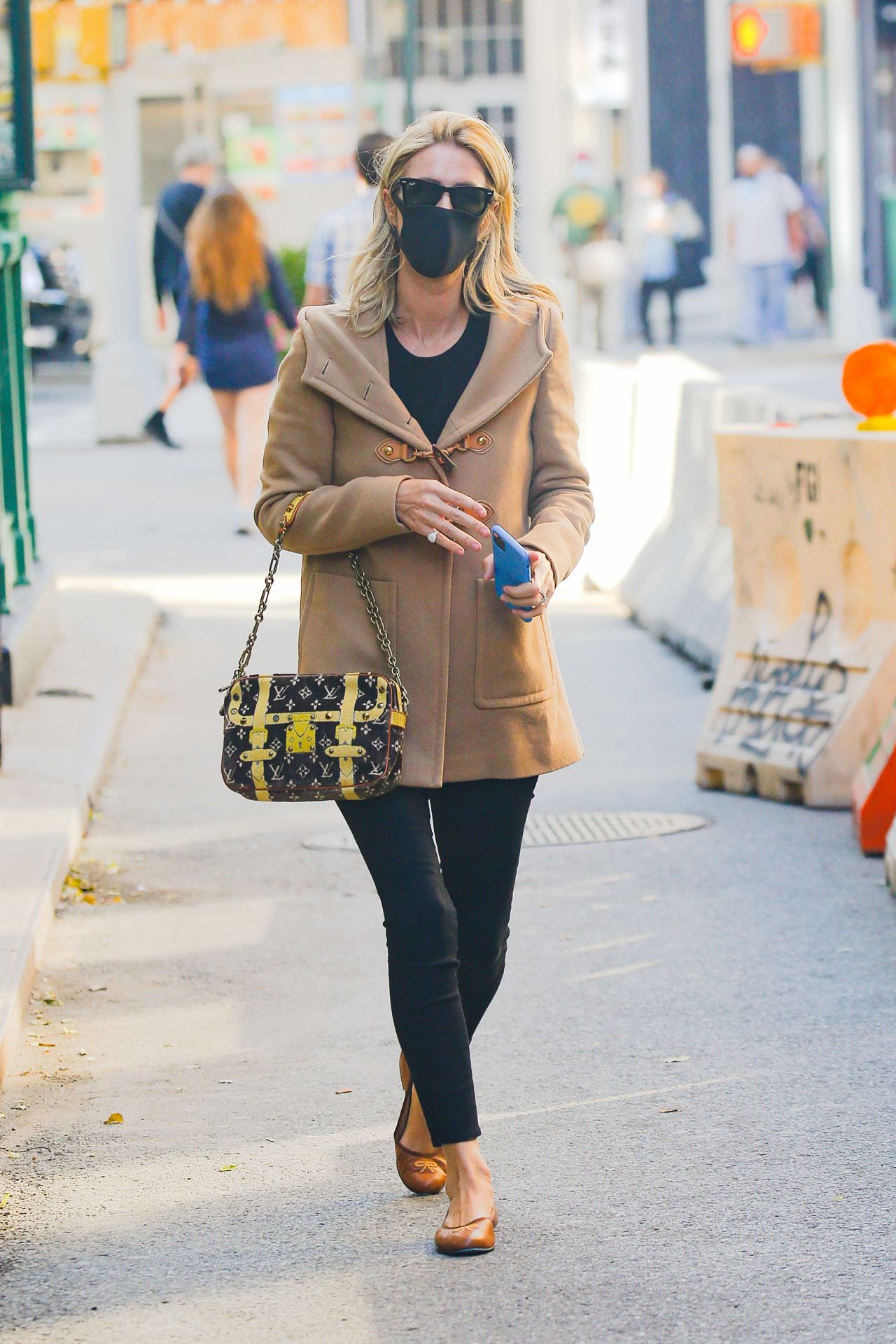Louis Vuitton Murakami Trouville Bag worn by Nicky Hilton