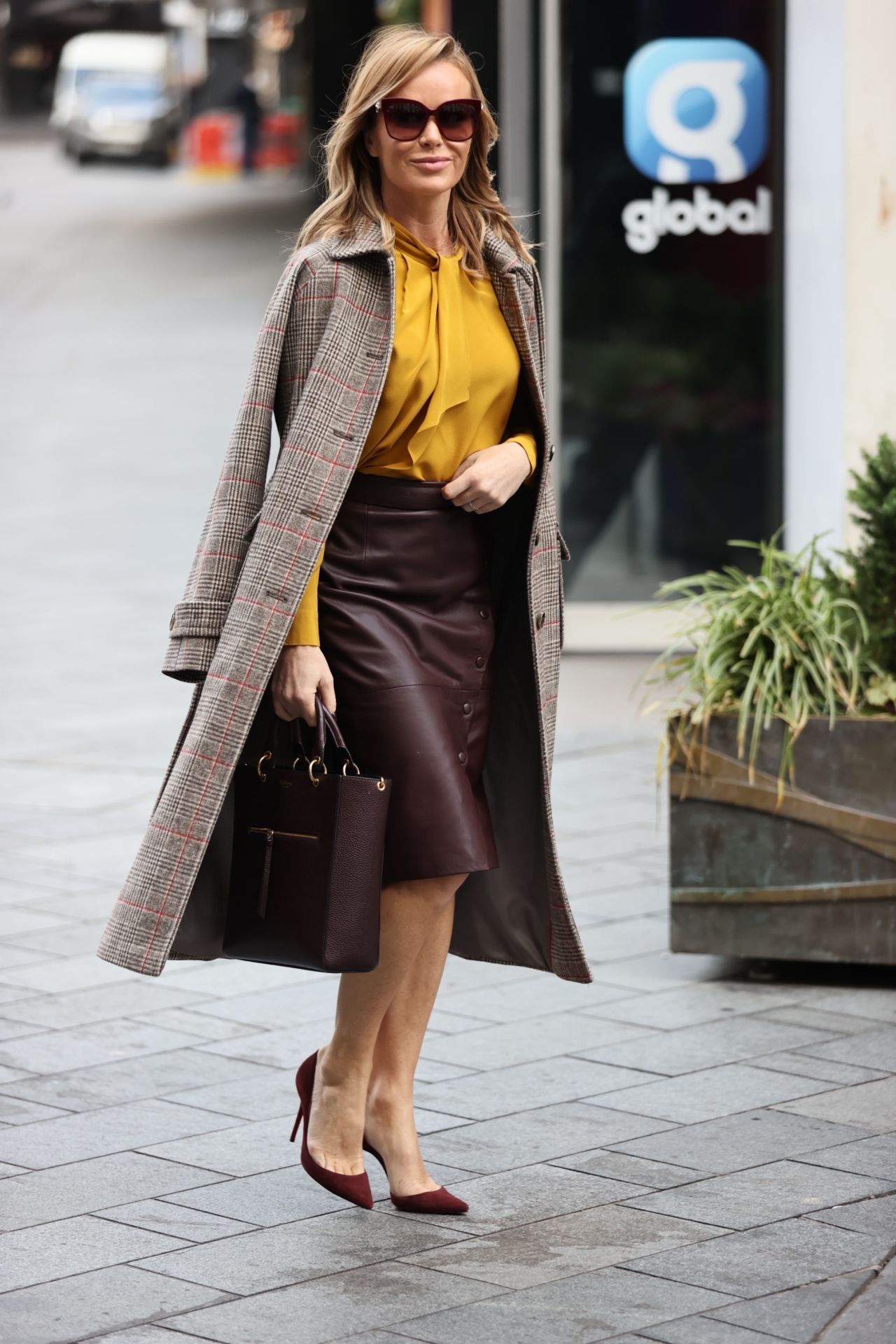 Amanda Holden in Burgundy Leather Dress and Mustard Yellow Top - London ...