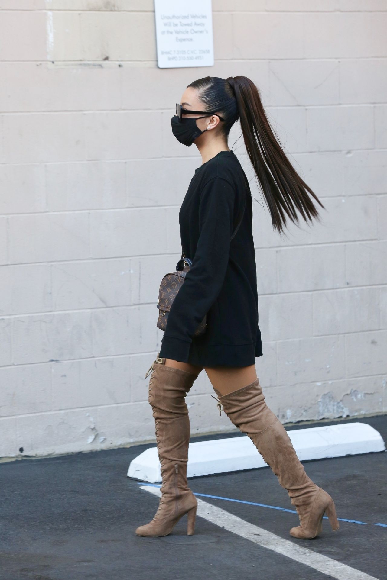 Ariana Grande In A Black Dress And Knee Beige Boots Beverly Hills 11