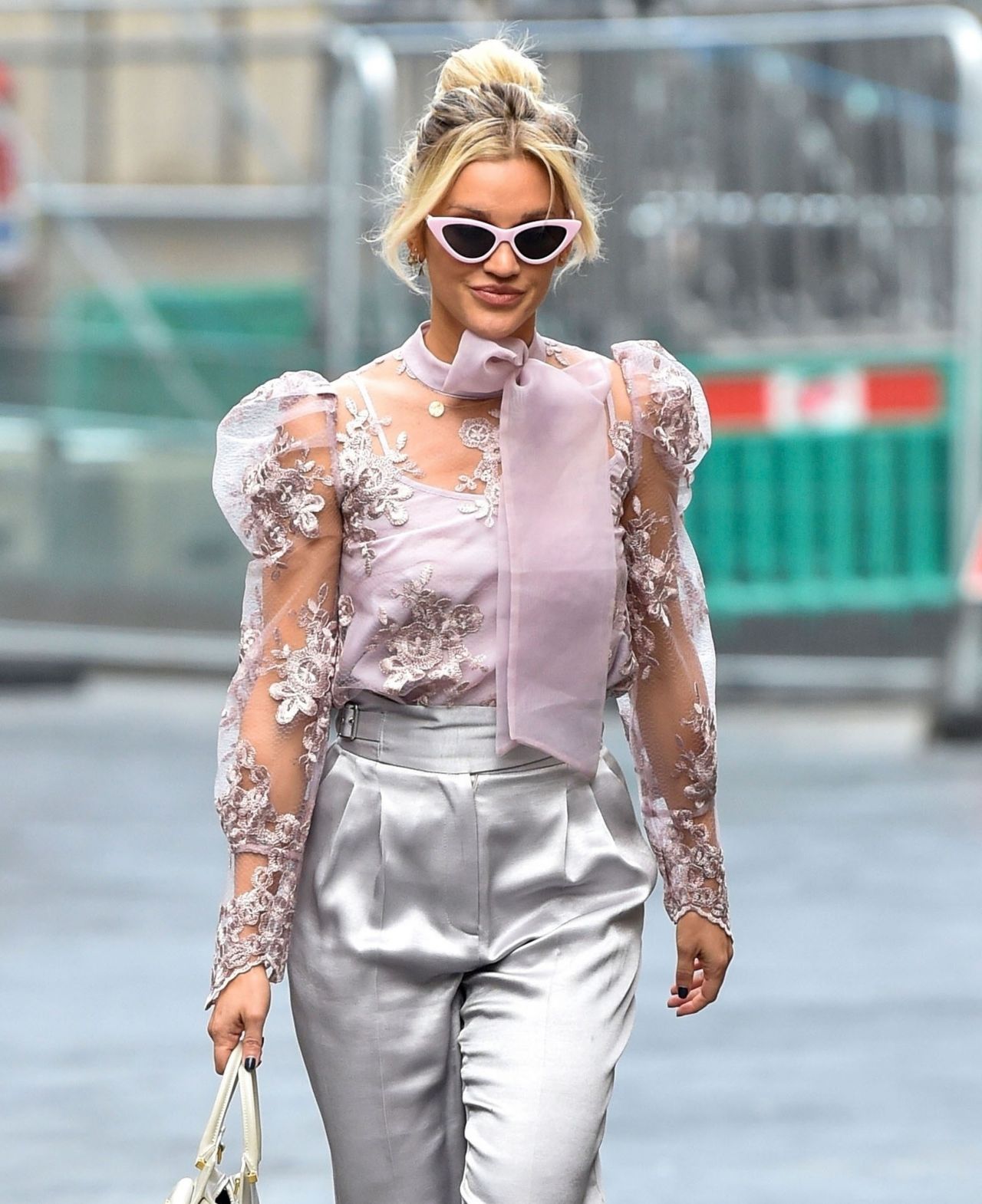 Ashley Roberts looks effortlessly chic in a satin blouse and paperbag waist  trousers