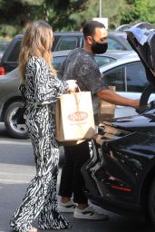 Chrissy Teigen in a Patterned Blouse and Pants - Los Angeles 11/05/2020