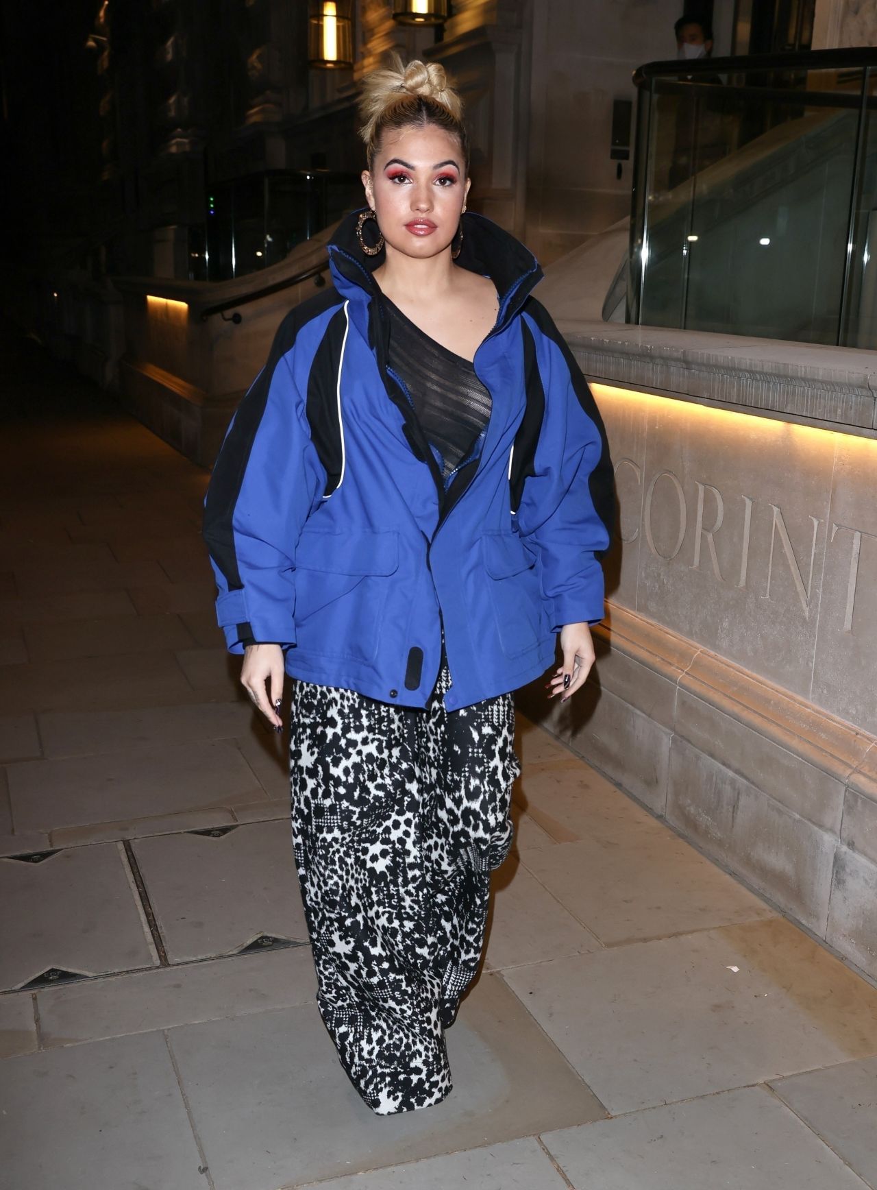 Mabel in a Revealing Mesh Top and Flared Trousers - Soho in London 11