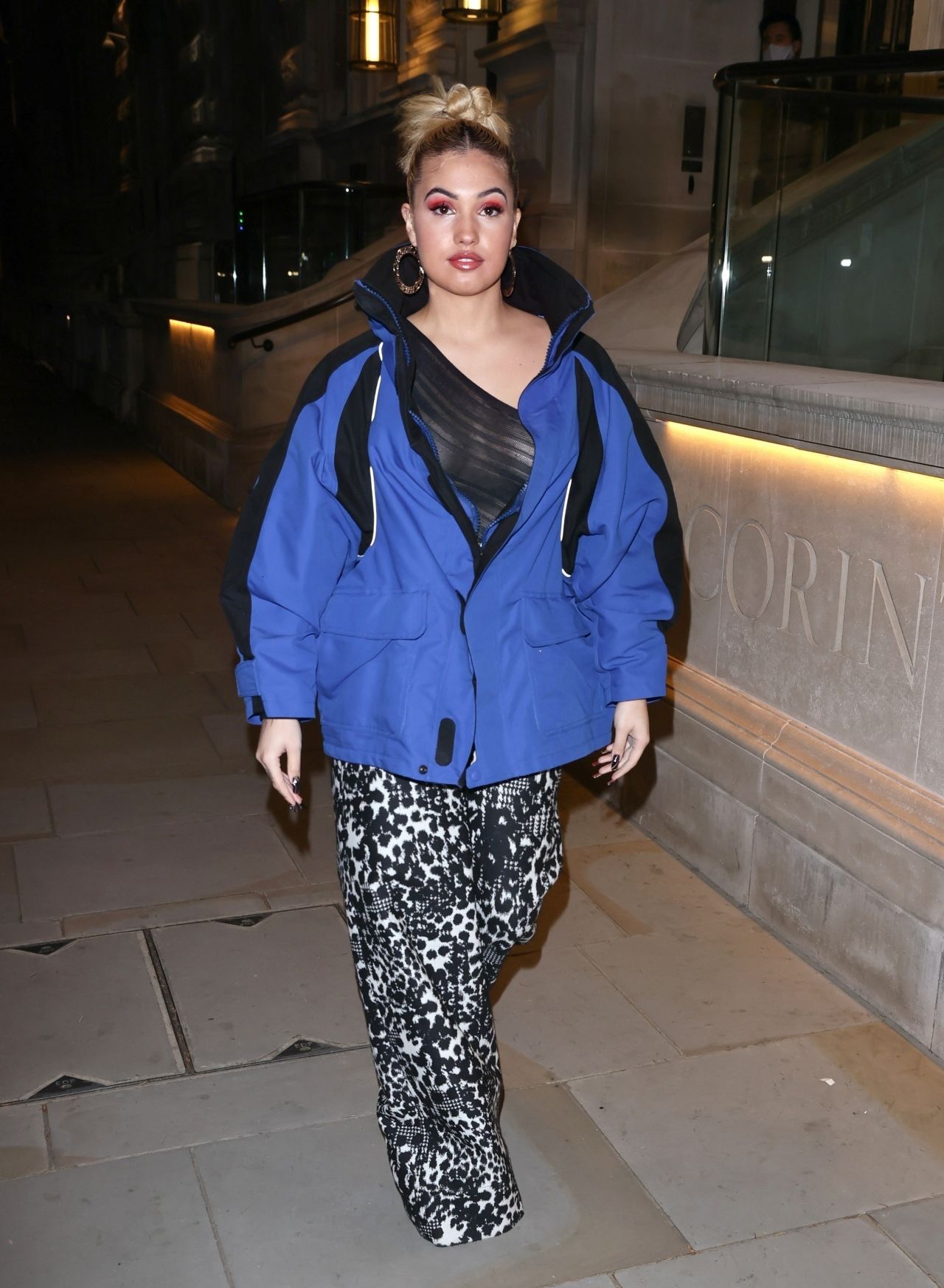 Mabel in a Revealing Mesh Top and Flared Trousers - Soho in London 11