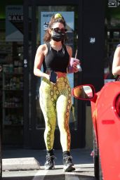 Vanessa Hudgens in a Yellow Snakeskin Leggings at Earthbar in LA 11/17/2020