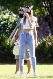 Candice Swanepoel in a Crop Top and Denim at a Park in Miami 12/25/2020